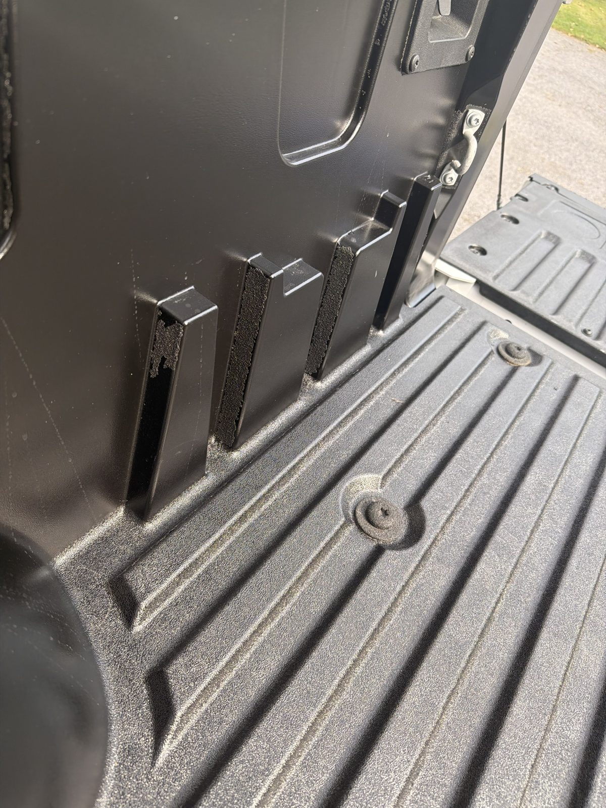Front wall of the truck bed after the liner was removed