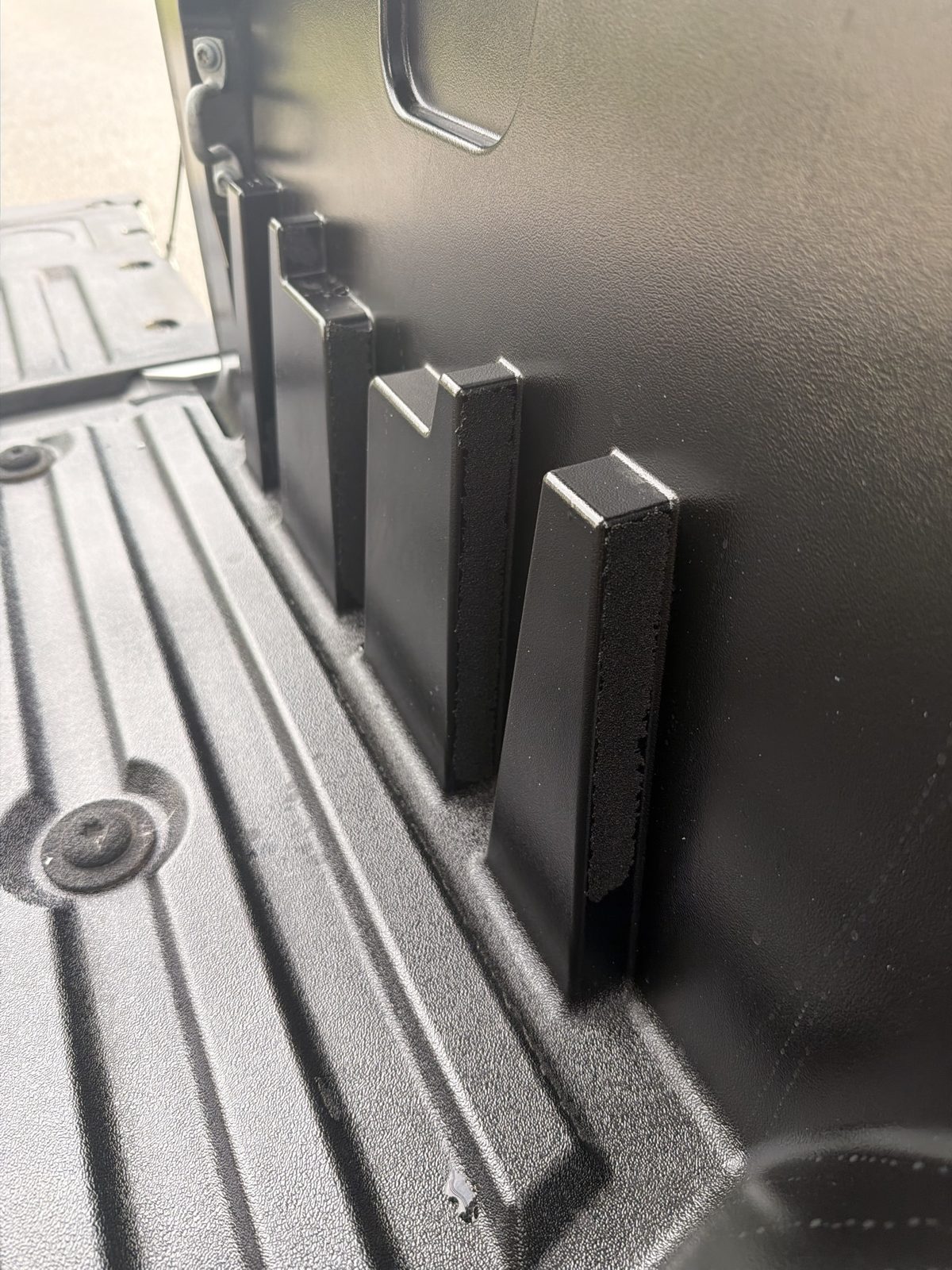 Close-up of the bed ribs with liner remnants
