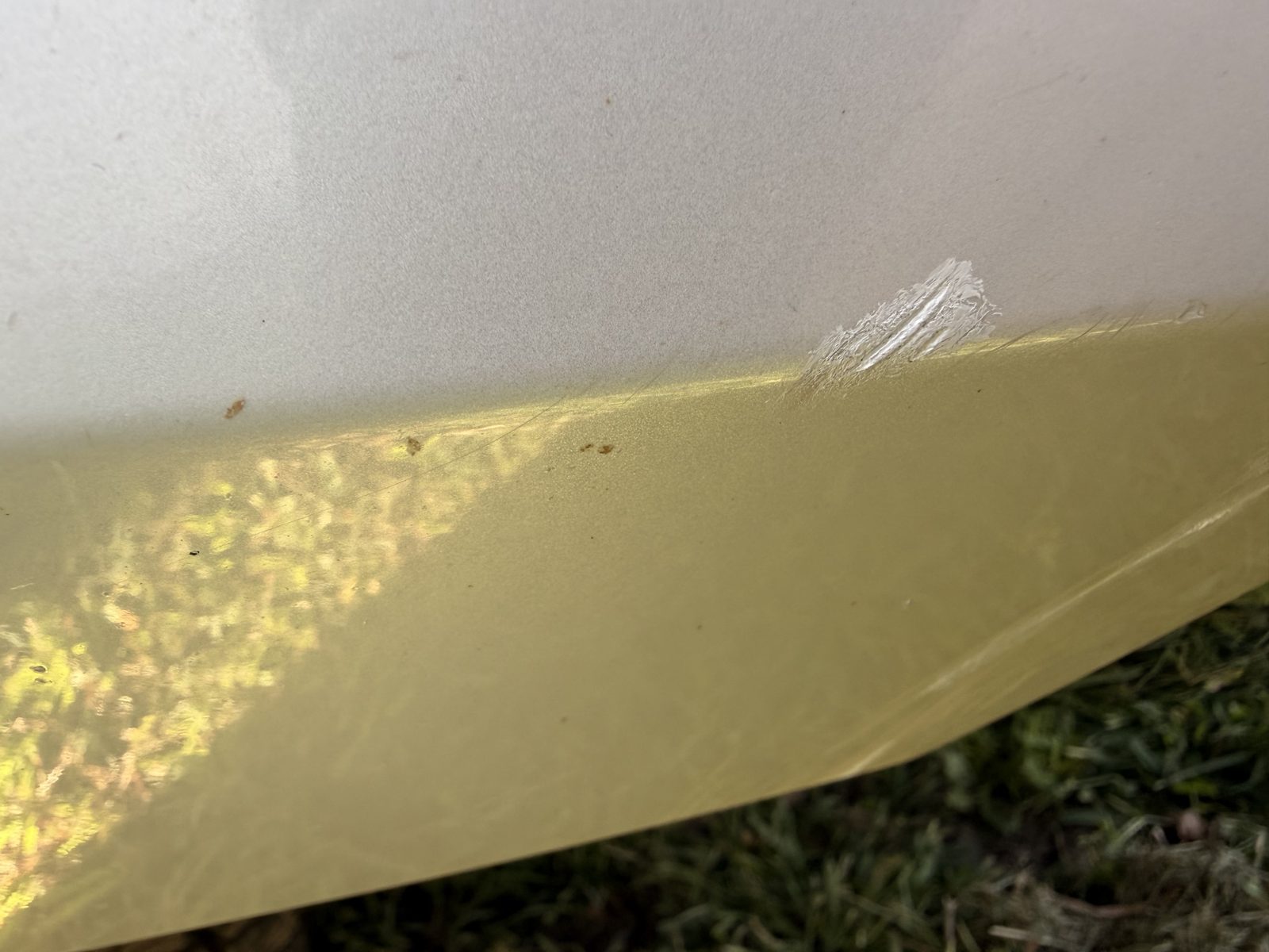 Scrape on the bumper edge with the lower valance below